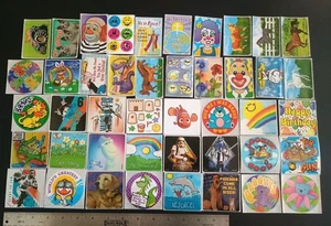 Lote de pegatinas vintage Smilemakers Medibadge Sandylion mezcla algunas nuevas 44 sin duplicación - Imagen 1 de 5