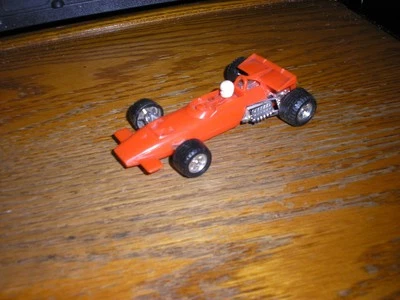 VINTAGE 4" de comprimento PLÁSTICO Funmate Indy IRL carro de corrida de Fórmula 1 laranja FRETE GRÁTIS - Imagem 1 de 4