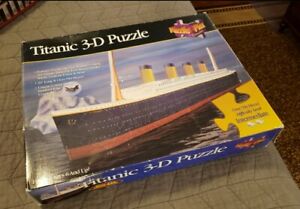 Titanic 3-D puzzle by puzzle plex open box new, never built, as pictured see...