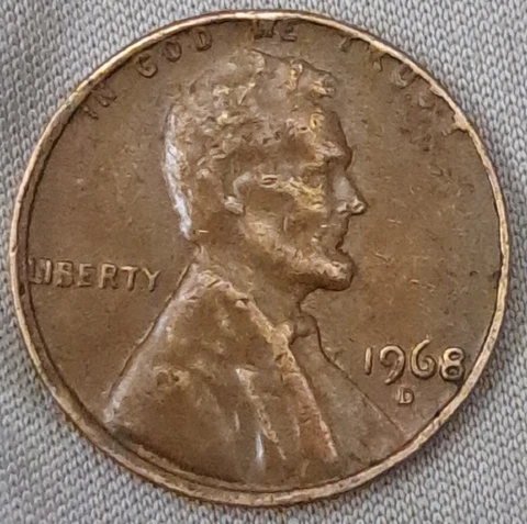 1968 D Lincoln Penny with Error on Top Rim, &"L" in Liberty on Edge Touching "I" Cover