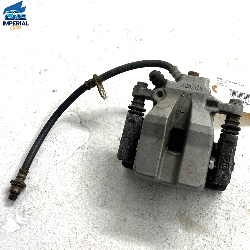 2018-2021 Toyota Camry Rear Left Driver Side Disc Brake Caliper Assembly OEM - Image 1 of 4