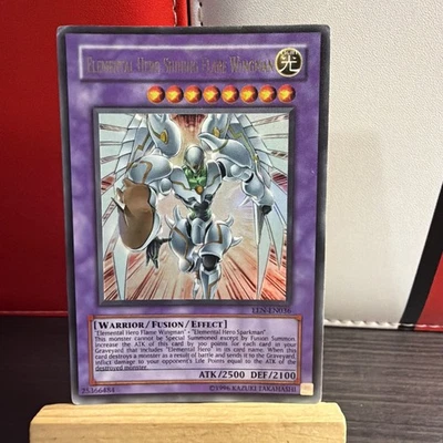 YUGIOH ELEMENTAL HERO SHINING FLARE WINGMAN EEN-EN036 ULTRA MP + BONUS HOLO - Image 1 of 4