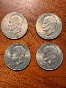 STRIKING VINTAGE SET OF FOUR (4) 1971 EISENHOWER SILVER DOLLARS NO MINT MARKS - Picture 1 of 2