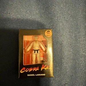Zuru Mini Brands NETFLIX Cobra Kai Toy Figure Rare Daniel Larusso - Picture 1 of 2