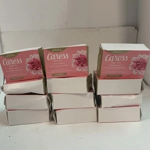 Sapone da bar floreale Caress Daily seta bianco pesca e fiori d'arancio 12 barrette 3,75 oz - Foto 1 di 3