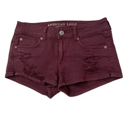 Pantalones cortos rasgados desgastados rojos American Eagle para mujer talla 4 Foto 1 de 4