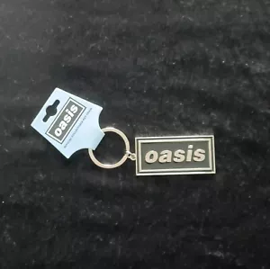 OASIS - LOGO METALL SCHLÜSSELANHÄNGER OFFICIAL BAND MERCH - Bild 1 von 1
