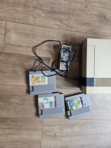Nintendo NES Console System Bundle (Tested Working) with With four Games - Picture 1 of 17