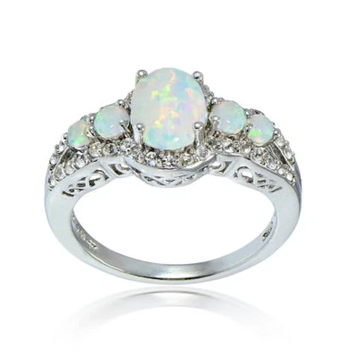 Simulated White Opal and Cubic Zirconia Oval Halo Five Stone Ring - Image 1 of 4