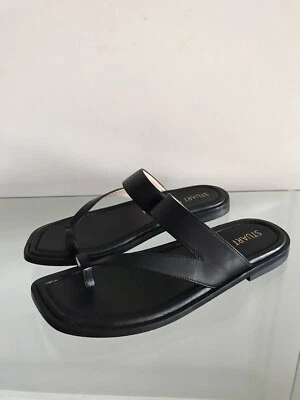  STUART WEITZMAN  LEATHER BLACK FLAT THONG SANDALS SIZE  9 1/2 MADE IN SPAIN - Image 1 of 4