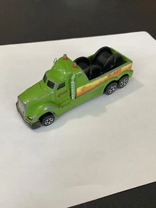HOT WHEELS 1998 DISASTERS HAULERS GREEN QUAKE LINE TRUCK - Picture 1 of 4