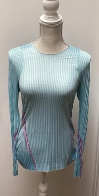 K-Swiss Mujer Plisado Manga Larga Tenis Crew Azul Claro y Rosa Talla Pequeña Foto 1 de 4