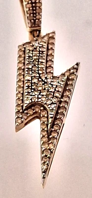 MULTITONE  GOLD AND 0.4 CARAT  DIAMOND  ZIG-ZAG  LIGHTNING  PENDANT - Image 1 of 4