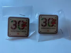 SUPER MARIO BROS 30TH ANNIVERSARY PIN BADGE x2 *NEW AND SEALED* - Picture 1 of 4