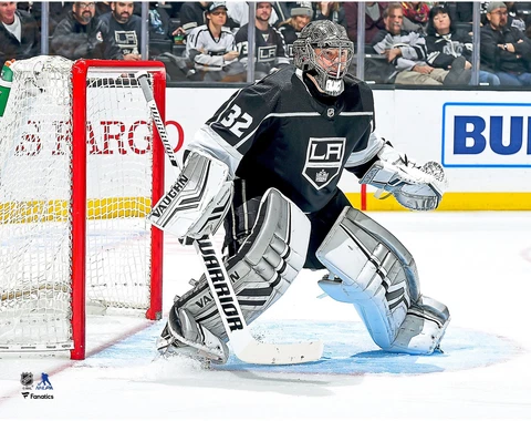 Jonathan Quick Los Angeles Kings Unsigned Black Jersey in Net Photograph Cover