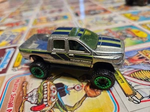 2006 Hot Wheels DODGE RAM 1500 silver Toyo Tires Variant w/green Rims - Picture 1 of 5