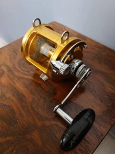 Penn International II 12T RH 4.1:1 Gold 34oz Used Baitcast Reel Fishing Aluminum - Picture 1 of 6