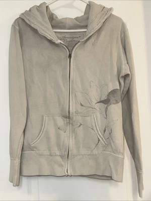 Sudadera con Capucha American Eagle Crema Cremallera Completa Talla Mediana Vintage Look con Flor Foto 1 de 4