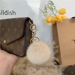 Bolso de pompón bola de piel de visón real de 5 cm encanto llavero colgante bolsa de teléfono accesorios - Imagen 1 de 15