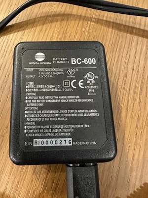 Cargador de batería Konica Minolta BC-600 cámara digital carga rápida 100-240V probado Foto 1 de 4