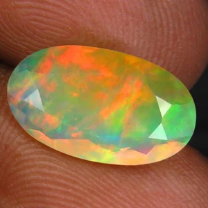 1.77 ct Phenomenal Oval (13 x 8 mm) Un-Heated Ethiopia Rainbow Opal Gemstone - Picture 1 of 2
