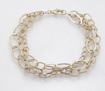 Brazalete Technibond Tres Hilos Martillado Ovalado Bordillo Placa Oro Amarillo 14K Plata Foto 1 de 4