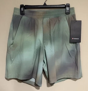 NUEVO CON ETIQUETAS Para hombres Lululemon Medium Pace Breaker Short 7” *Pantalones Cortos Sin Forro CDGM Verde - Imagen 1 de 3