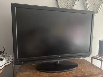 Televisión RCA 33 con soporte ovalado soporte de TV soporte de televisión Foto 1 de 2