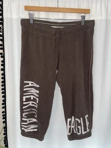 PANTALONES DE CHÁNDAL AMERICAN EAGLE CAPRI RECORTADOS PARA MUJER M MARRÓN MEDIO VINTAGE - Imagen 1 de 6