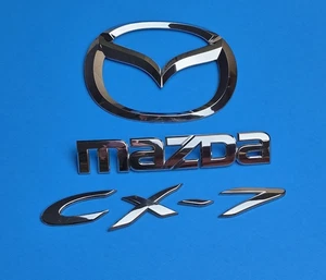 07 08 09 10 11 12 MAZDA CX-7 CX7 TAPA TRASERA CROMO EMBLEMA LOGOTIPO INSIGNIA SIGNO OEM SET - Imagen 1 de 9