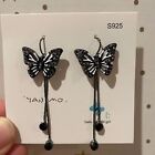 New Butterfly earrings Black with white wings and dangling beads