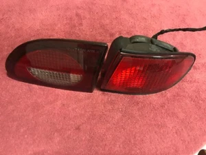 95 - 2002 Chevrolet Cavalier Passengerside taillight Assembly 16519320 16525524 - Picture 1 of 5