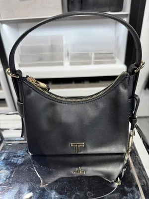 NUEVO Bolso Bandolera Hobo Tumi Voyageur EVORA MINI 100 % Cuero 6.75” NEGRO con DORADO Foto 1 de 4