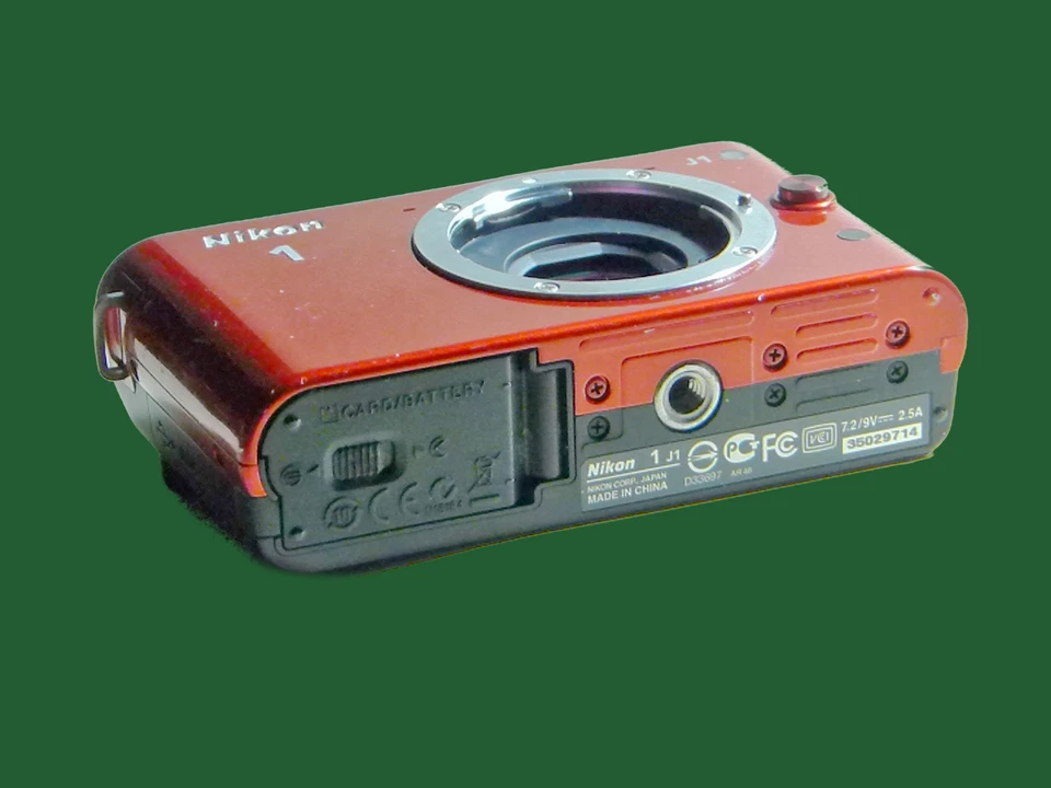 Cámara digital Nikon 1 J1 roja con batería - sin lente - probada leer envío gratuito Foto 1 de 4