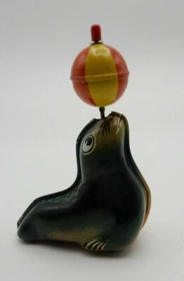 复古 LEHMANN AHA 910 锡石墨摩擦玩具密封带球德国西部 — 第 1/3 张图片