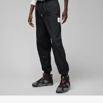 Pantalones tejidos Nike Air Jordan Essential negros blancos para hombre talla M y L DQ7474 010 Foto 1 de 4