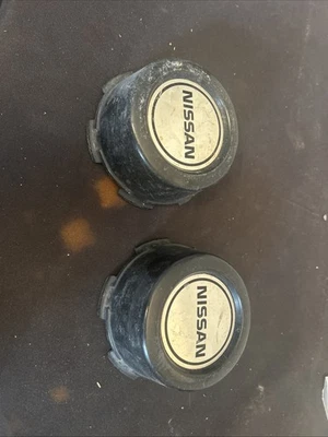 Nissan 1987-1997 carrocería dura D21 Pathfinder llanta de acero tapa central de plástico #7 Foto 1 de 4