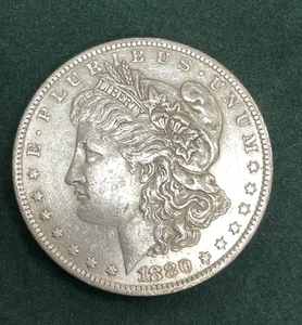 1880- O Morgan dollaro d'argento New Orleans - Foto 1 di 5