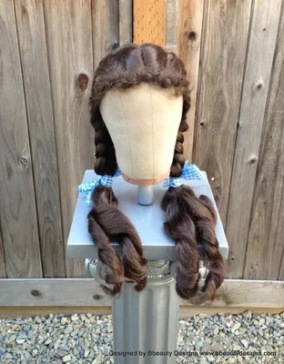 Dorothy Wizard of Oz Style Wig in Chestnut Brown with French Braids and Curls - Image 1 of 4