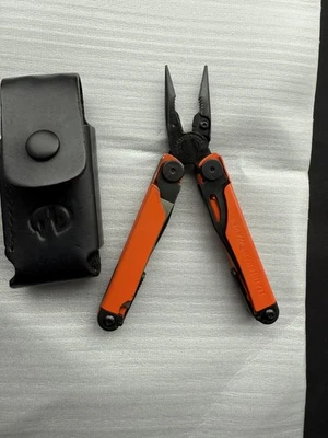 Leatherman Wave Plus Multi Tool 18Tools Black Oxide Orange. - Image 1 of 4