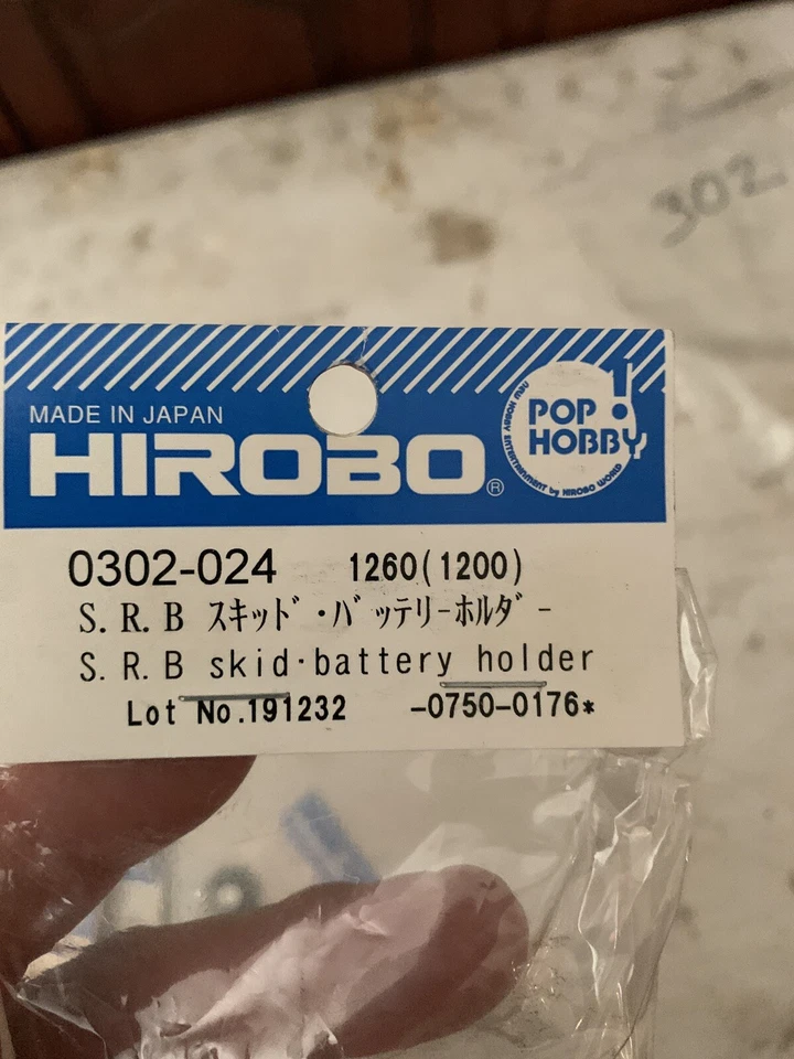 Vintage HIROBO 0302-024 SRB SKID AND BATTERY HOLDER #0302024 HELICOPTER PARTS - Image 1 of 3