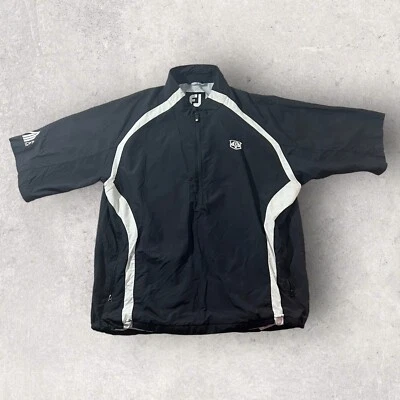 Chaqueta cortavientos Footjoy para hombre grande negra 1/2 bolsillos con cremallera golf manga corta Foto 1 de 4