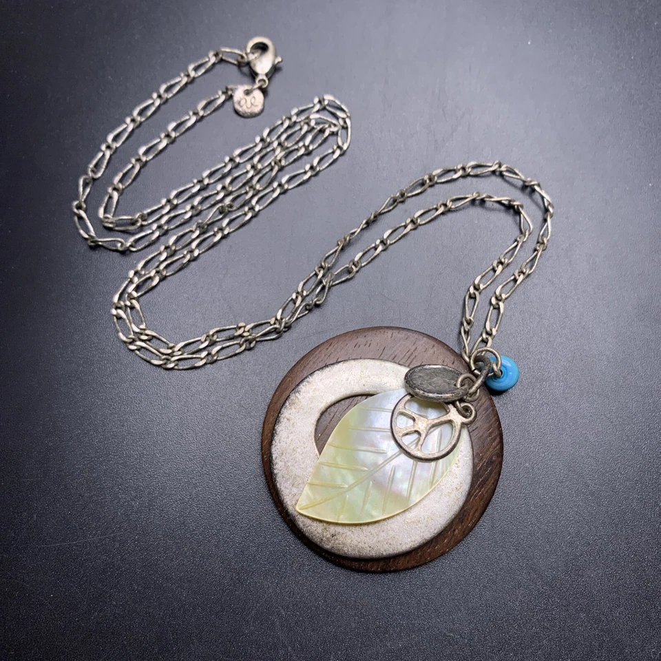 Collar colgante con dije de águila americana tono plata boho signo de paz hoja concha Foto 1 de 4