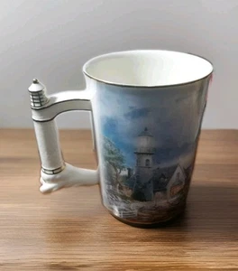 Thomas Kinkade Kaffeetasse "A Light in the Storm" #A969H SCHÖNE Sammeltasse - Bild 1 von 8