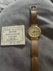1998 Anne Klein Watch Gold Tone Brown Leather Thin Band Lion Face NOT TESTED - Picture 1 of 5