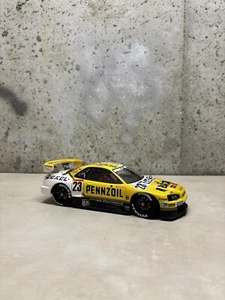 AutoArt 1/18 Scale - 2001 Nissan Skyline R34 JGTC - #23 Pennzoil Nismo GT-R - Picture 1 of 9