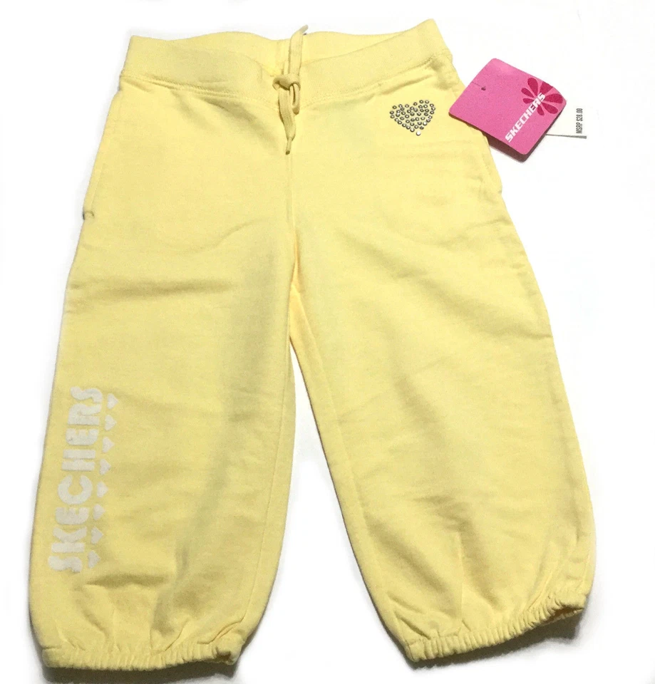 Pantalones deportivos Skechers para niñas talla 6 y 6X adornados ropa de juego algodón amarillo Foto 1 de 4