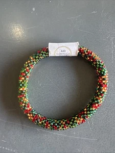 Aid Through Trade Roll-On® Bracelet "Nutcracker Speckled" Glass Beads ~Nepal~ - Picture 1 of 6