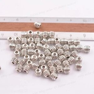 100 piezas dijes redondos de plata tibetana espaciador hallazgos de joyería 5*4,5 mm A3042 - Imagen 1 de 7