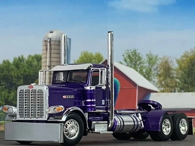 1/64 DCP PURPLE PRIDE & CLASS PETERBILT 389 DAY CAB - Image 1 of 4
